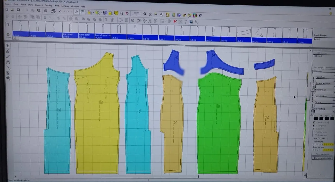 Pattern pieces of a garment shown in colour on a pattern software screen